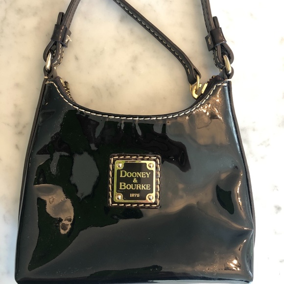 Dooney & Bourke Handbags - Dooney & Bourke black, patent leather purse